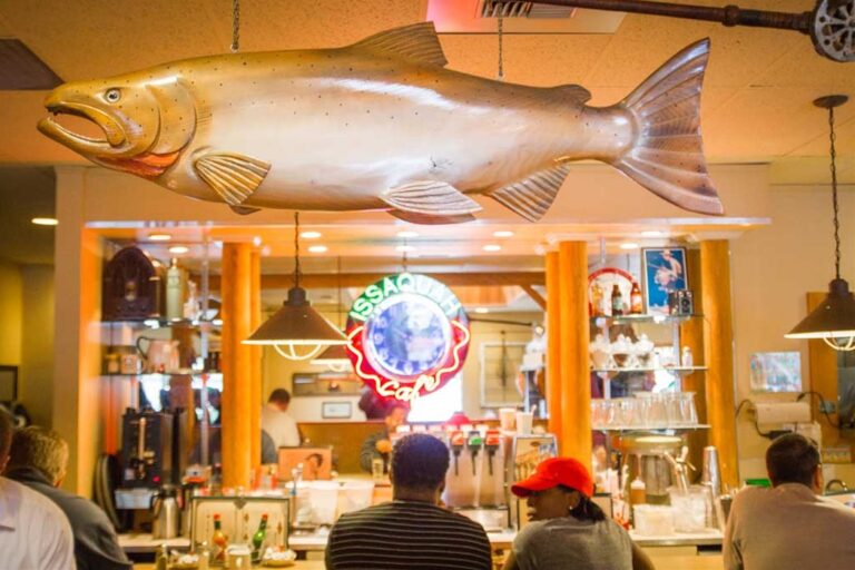 Inside Issaquah Cafe, with its landmark carved salmon and neon sign