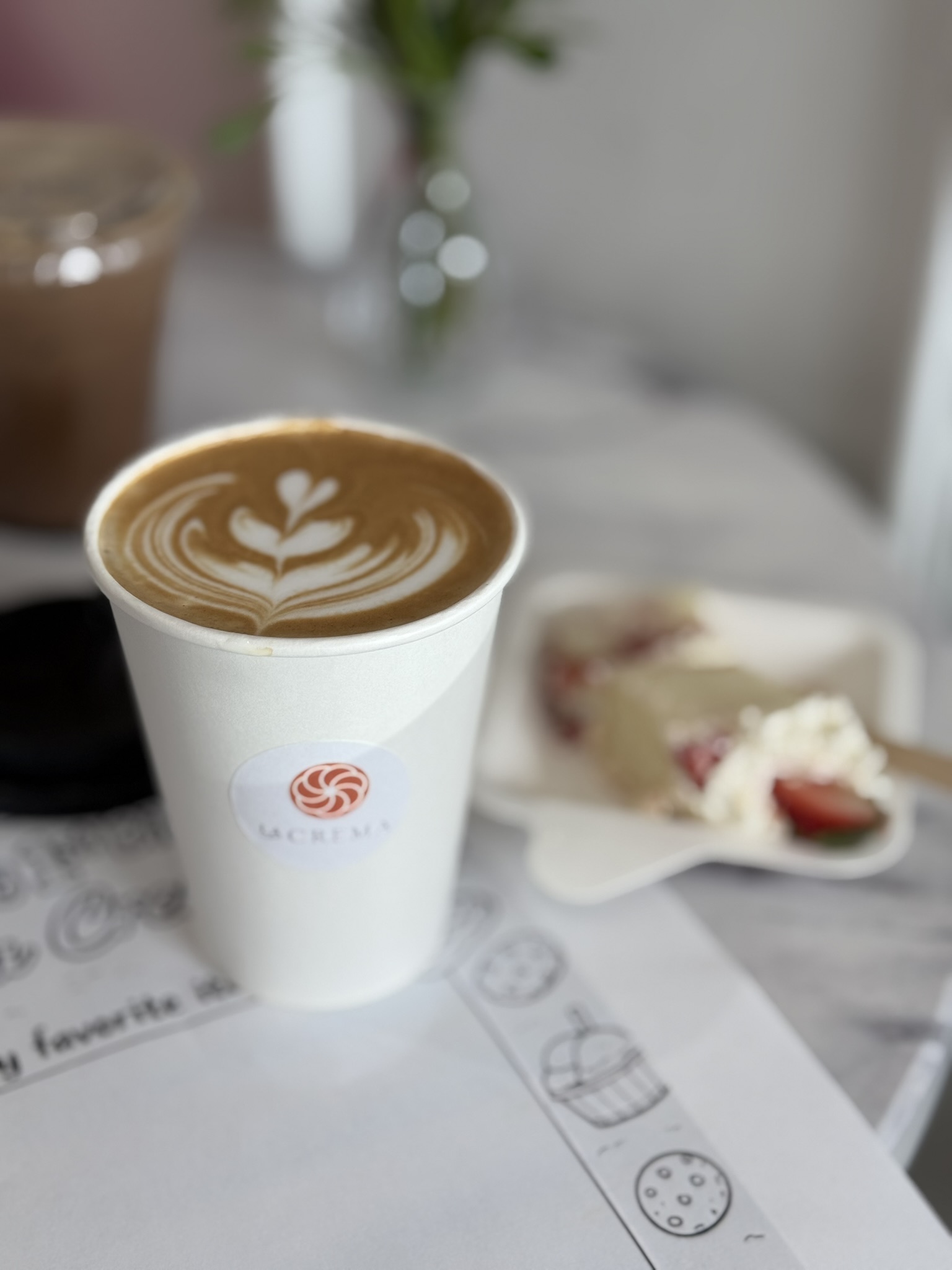 Latte and pastry at La Crema Patisserie